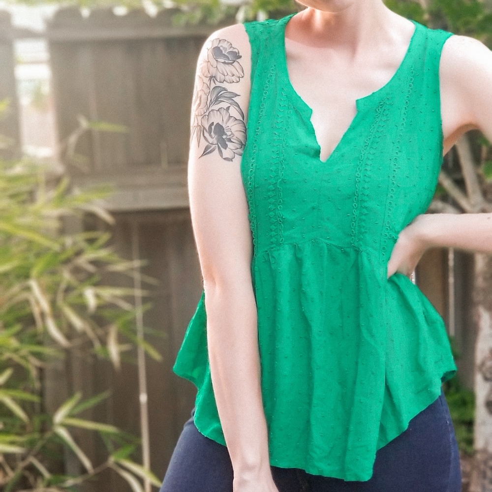 Green peplum top
